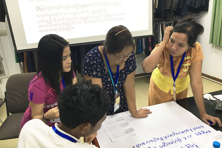 Worker-management committee representatives engage in a breakout activity during a training conducted by Gap Inc. 